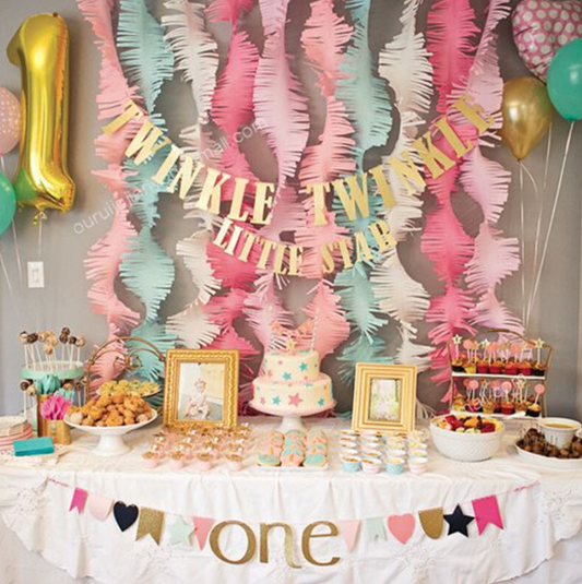 Guirnalda papel espiral rosado