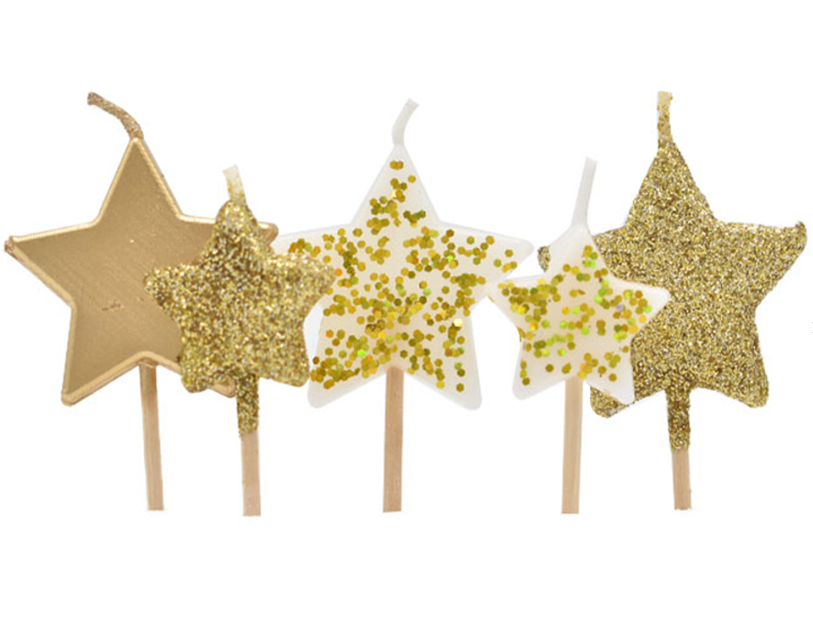 Velas estrellas doradas