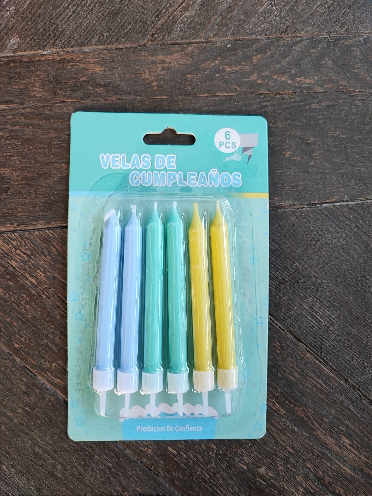 Velas tonos celestes y amarillo