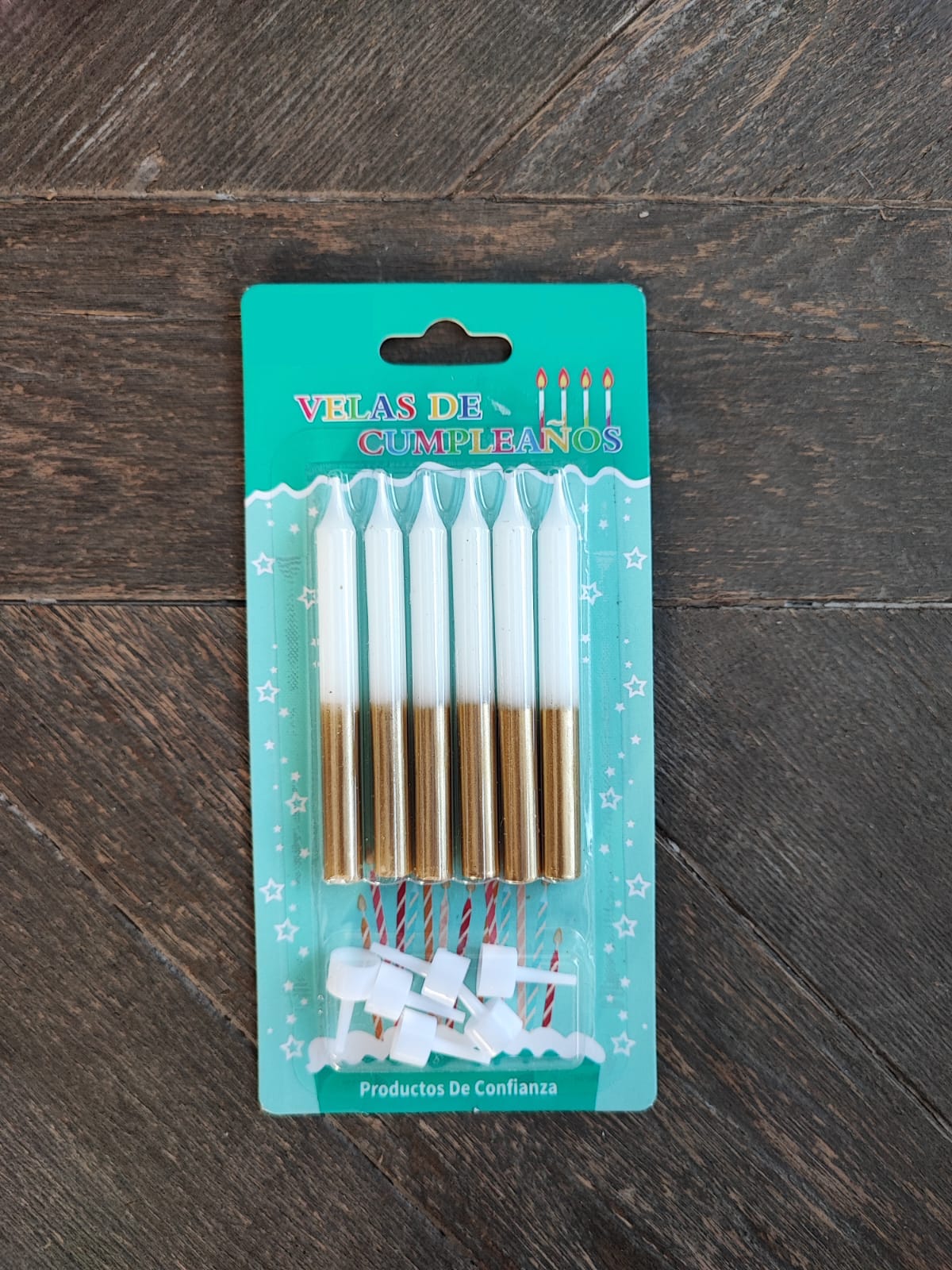 Velas blanco y dorado