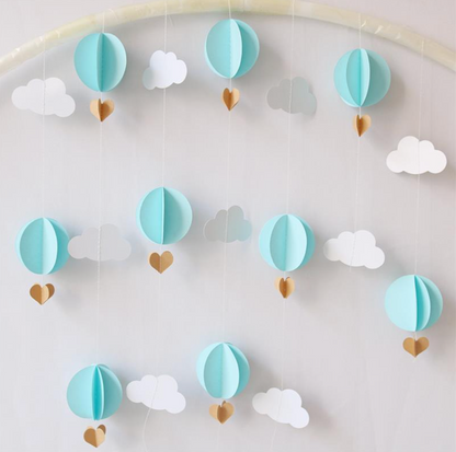 Guirnalda de globos aerostáticos celeste